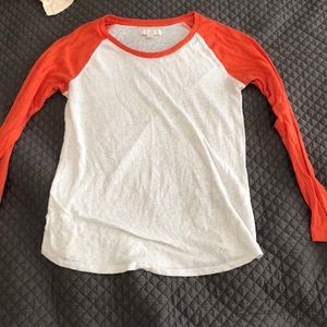 White and orange shirt